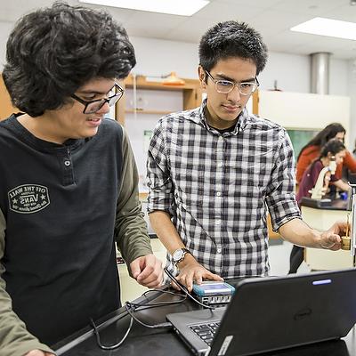 Early college high school students working in class.